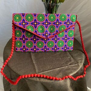 Pink and red floral printed shoulder clutch